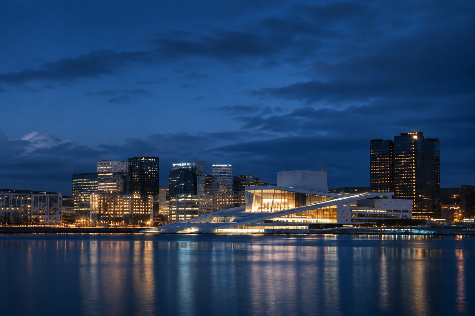 Oslo&rsquo;s waterfront skyline and Opera House at night, reflecting the city&rsquo;s financial district and representing the infrastructure behind growth in Nordic capital markets